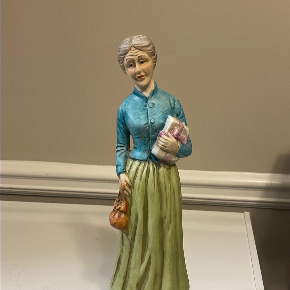 Vintage Figurine with Blue Jacket and Green Skirt